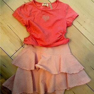 Super cute cut out shirt with ruffle skirt in pink 5-6T.